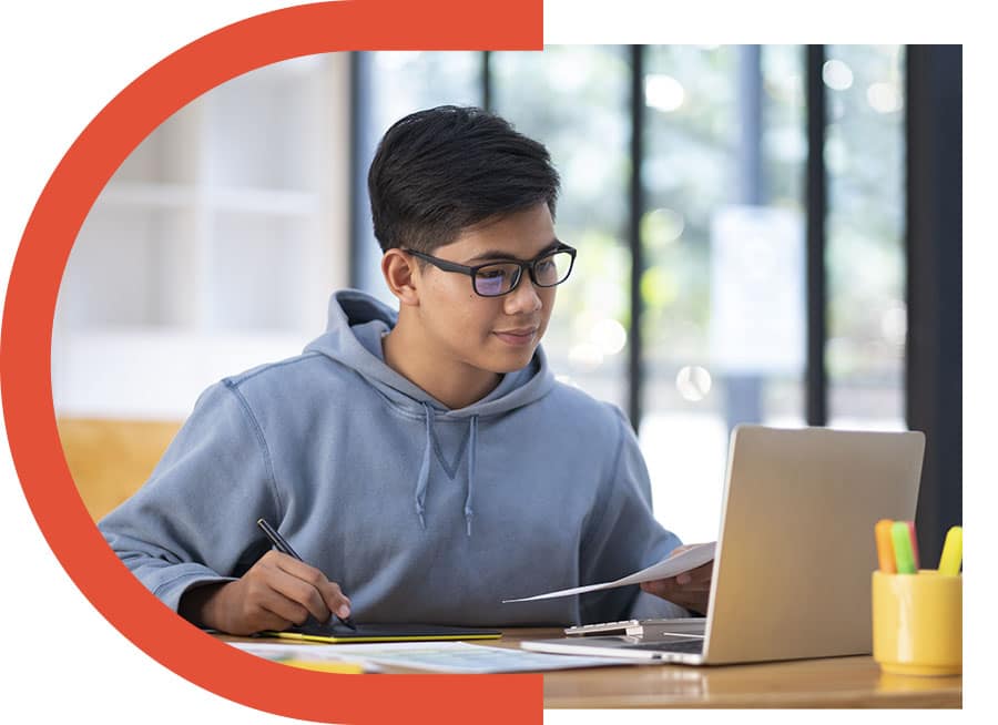 Young man sitting at a laptop