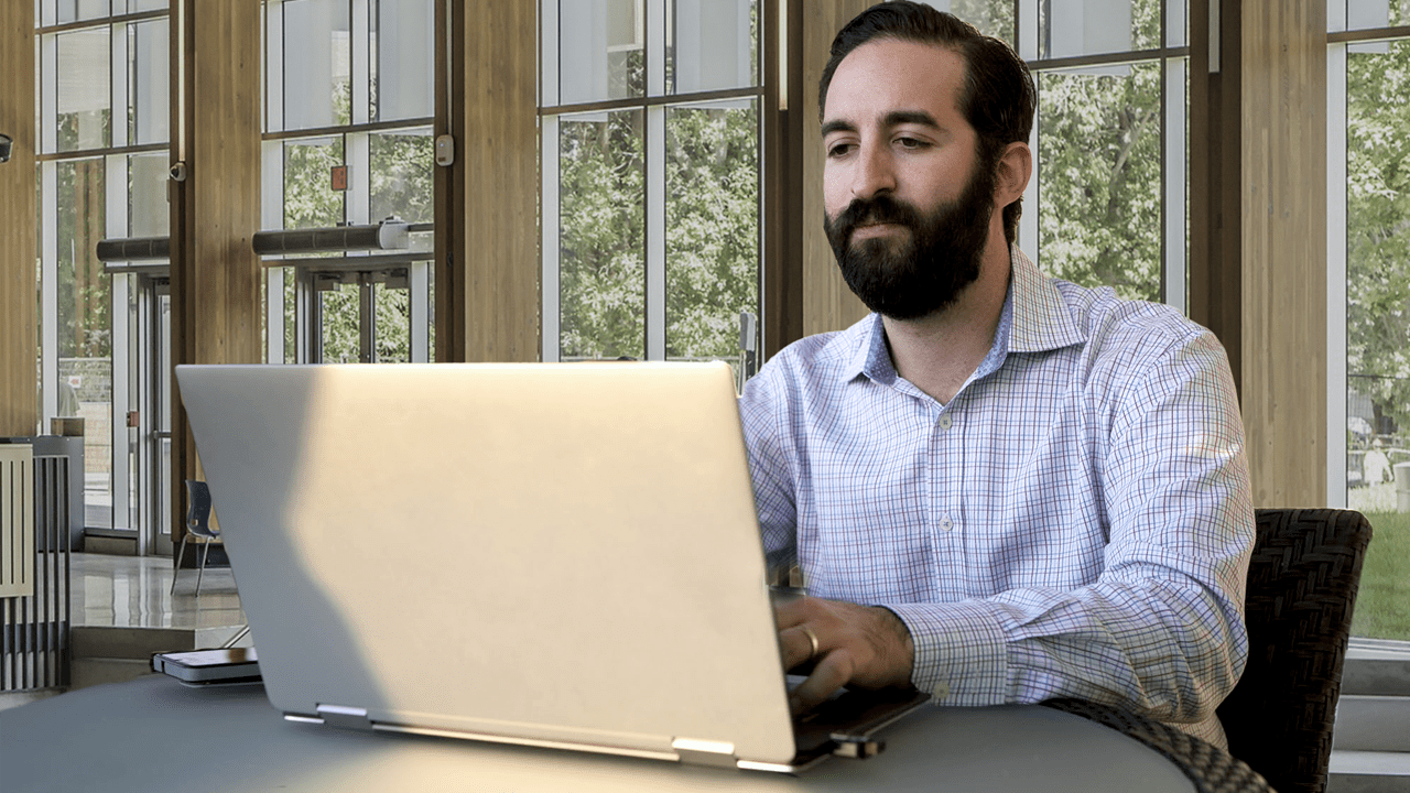 Man working using his laptop